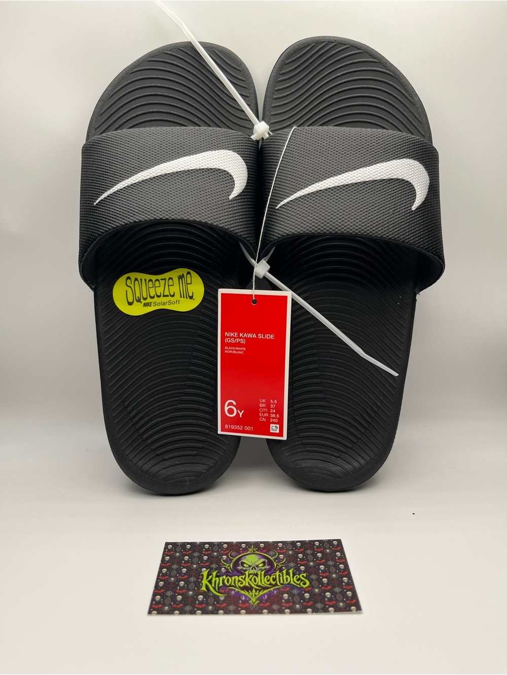 Nike Kids Black Slides with White Swoosh